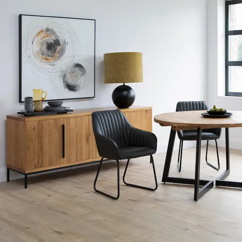Mila Round Oak Dining Table and Sideboard from EZ Living Furniture.