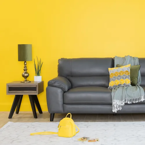 Alfredo Sofa with yellow wall from EZ Living Furniture.