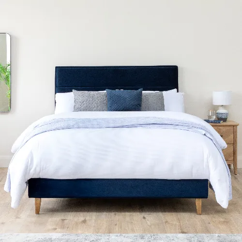 Neutral Wall with ebony blue bed frame from EZ Living Furniture.