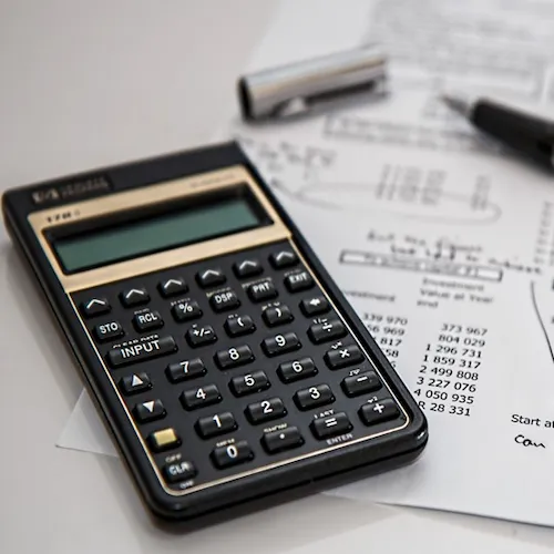 Calculator with budget sheet.
