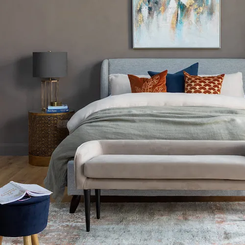 Cushions on bed from EZ Living Furniture.