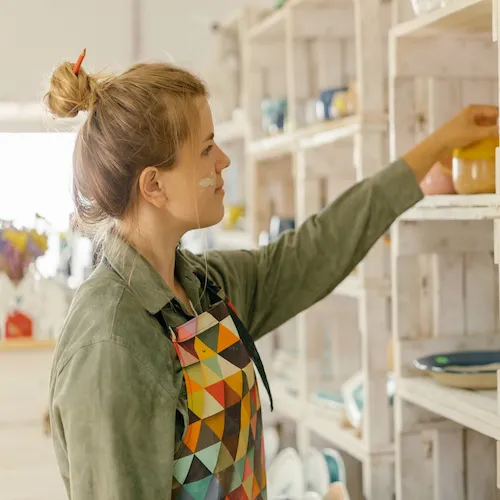 Woman in pottery class.