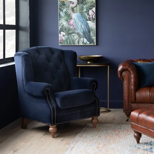 Adare blue velvet Chesterfield wing armchair from EZ Living Furniture.