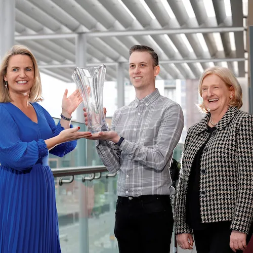 Robert Walsh eCommerce & Marketing Manger at EZ Living Furniture accepts award