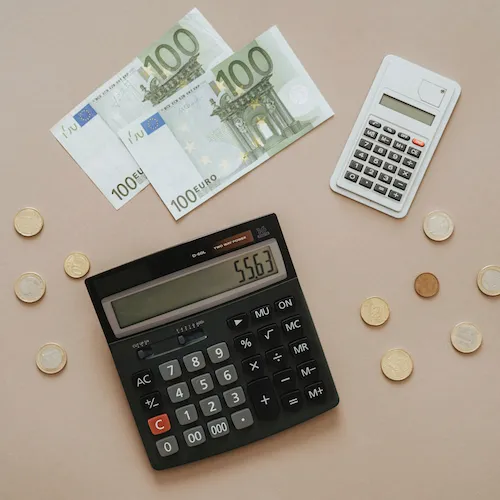 Calculator and money.