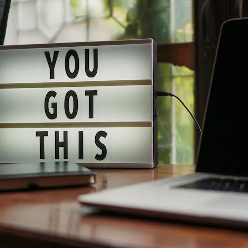 Inspiration and motivation sign with laptop
