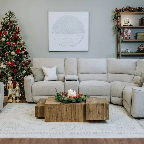 Pine and berry wreath as table decor at EZ Living Furniture.