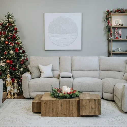 Red Berry Wreath on coffee table as decor at EZ Living Furniture.
