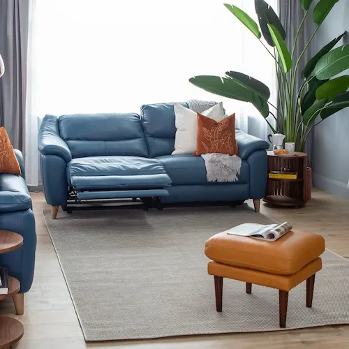 Blaze blue reclining sofa at EZ Living Furniture.