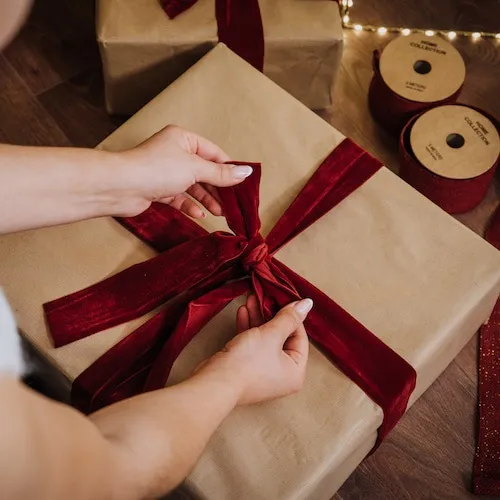 Wrapping a gift for Christmas