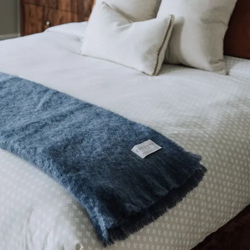 Hague By Foxford Blue Mohair Throw at EZ Living Furniture.