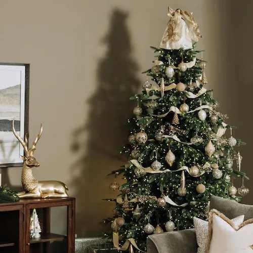Gold & White Angel Tree Topper at EZ Living Furniture.