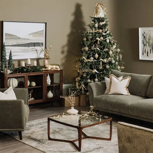 Boutique Sofa & Rockerfeller Christmas Tree with Christmas decorations from EZ Living Furniture.