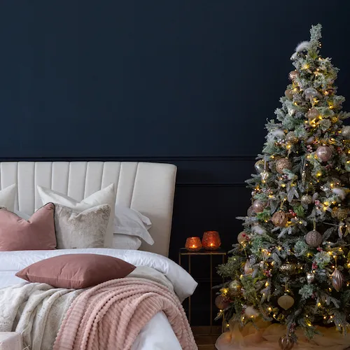 Vermont Snow Christmas Tree in a bedroom from EZ Living Furniture.