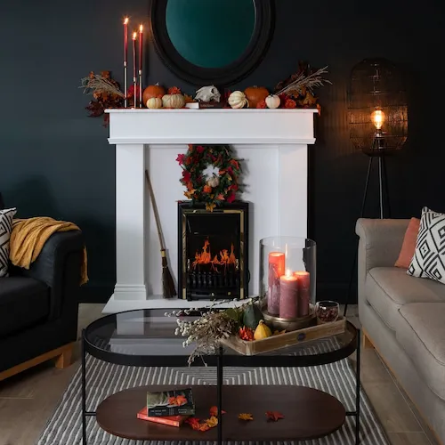 Decorated fireplace with autumnal decorations