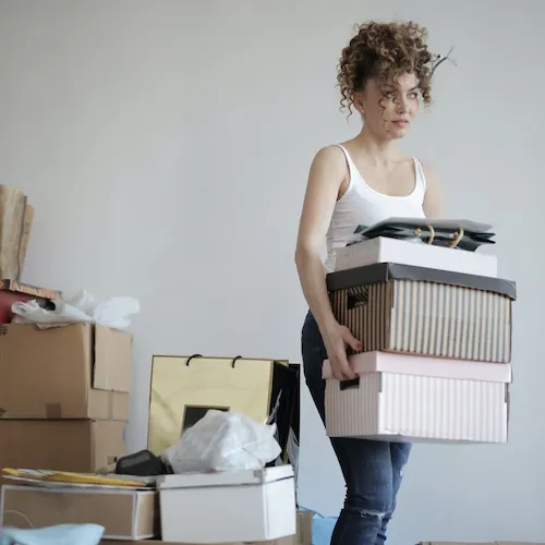 Woman moving boxes.