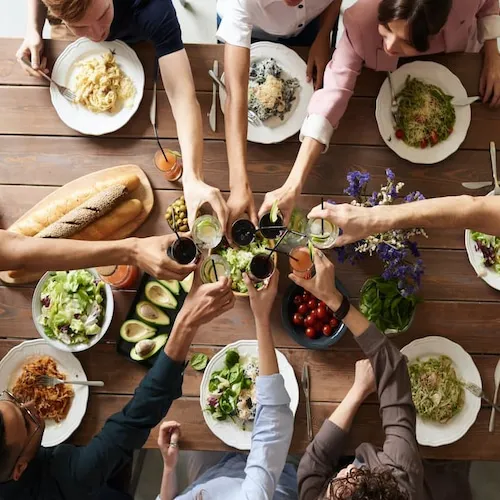 Group of people at a dinner party.