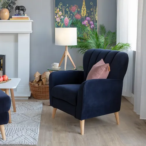 Navy velvet Harper armchair from EZ Living Furniture.