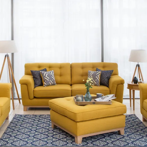 Fjord yellow sofa and footstool from EZ Living Furniture.