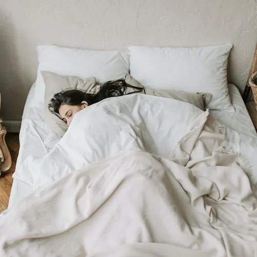 Woman sleeping in bed
