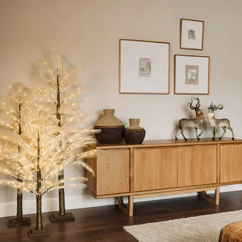 Reed pampas grass LED light trees at EZ Living Furniture.