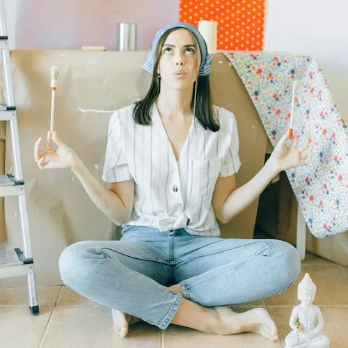 Woman meditating while decorating