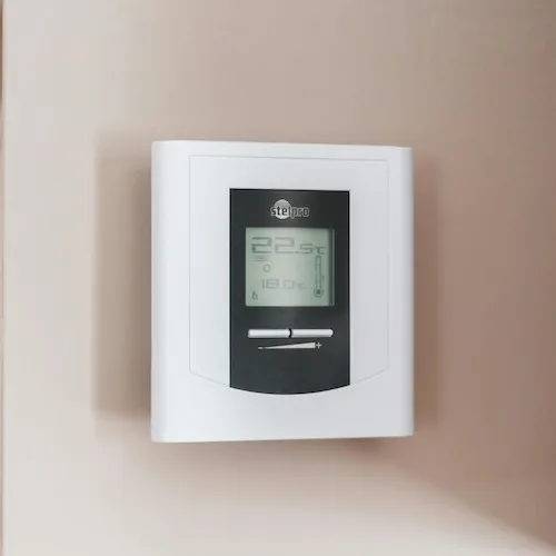 Thermostat on wall