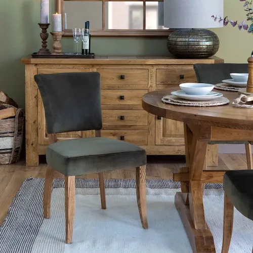 Athy Green Velvet Dining Chair with stud detailing at EZ Living Furniture.
