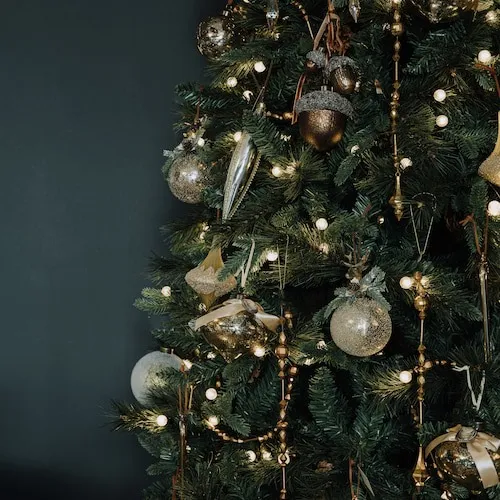 Gold & Bronze baubles on tree from EZ Living Furniture.