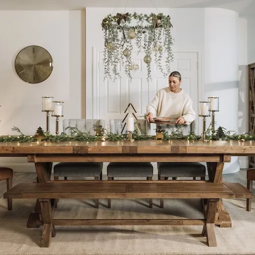 Adair hanging wreath with festive table decor and candle holders at EZ Living Furniture.