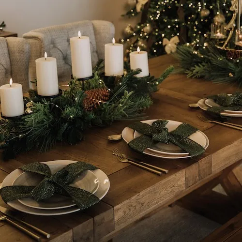 Dining table decorated festively.