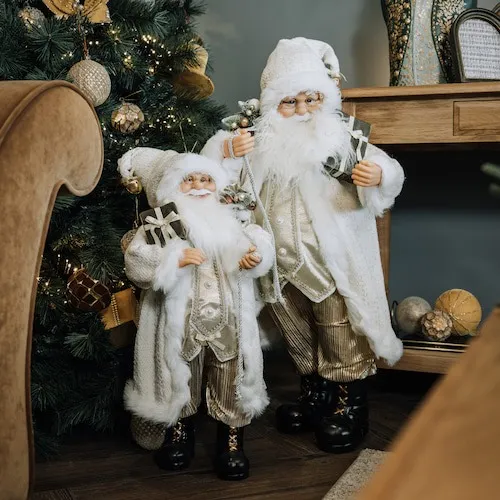 Large and Small Saint Kris Standing Decoration at EZ Living Furniture.