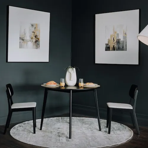 Sonoma Black Round Table at EZ Living Furniture.