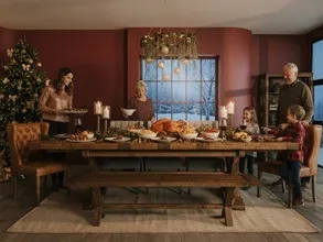 Christmas Room and family celebrating dinner together